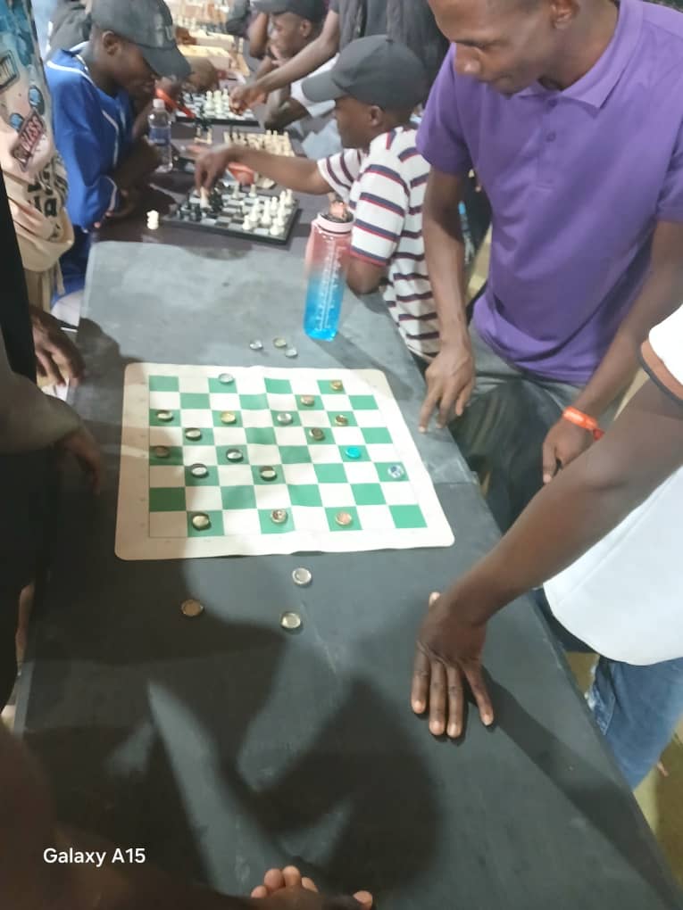 Players competing in a board game